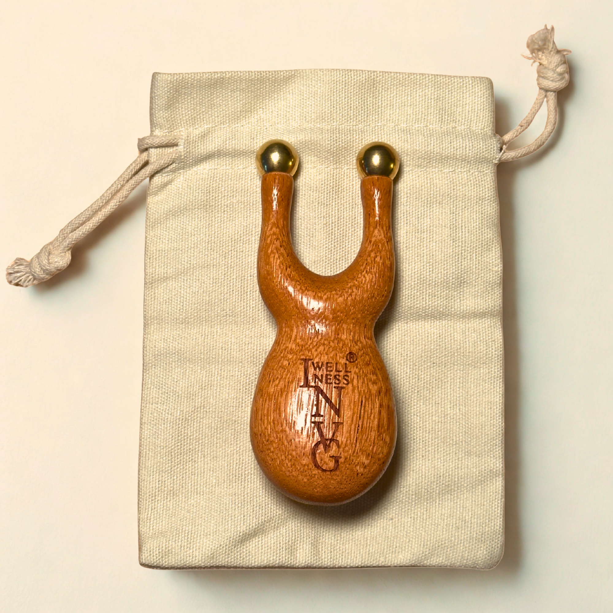 The INVG Scarab – Walnut & Brass Acupressure Tool