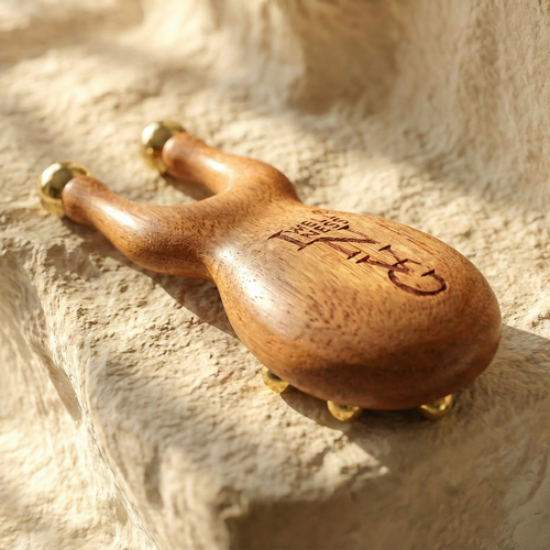 The INVG Scarab – Walnut & Brass Acupressure Tool